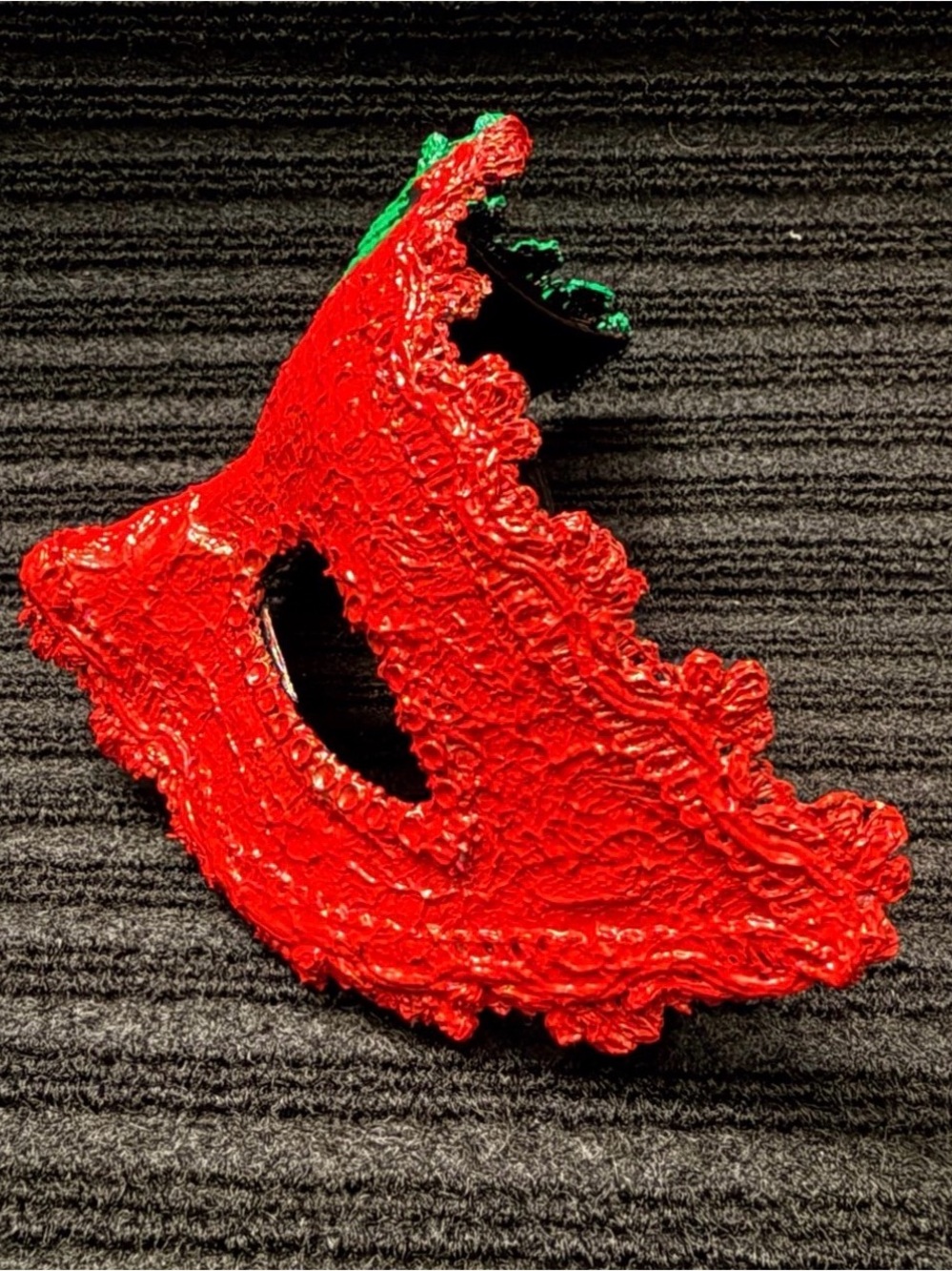 Handmade mask half green and half red!